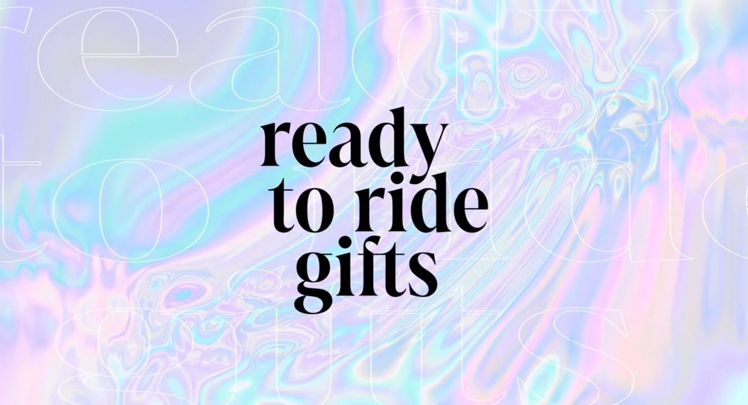 A holographic image with black graphic text, "Ready to ride gifts"