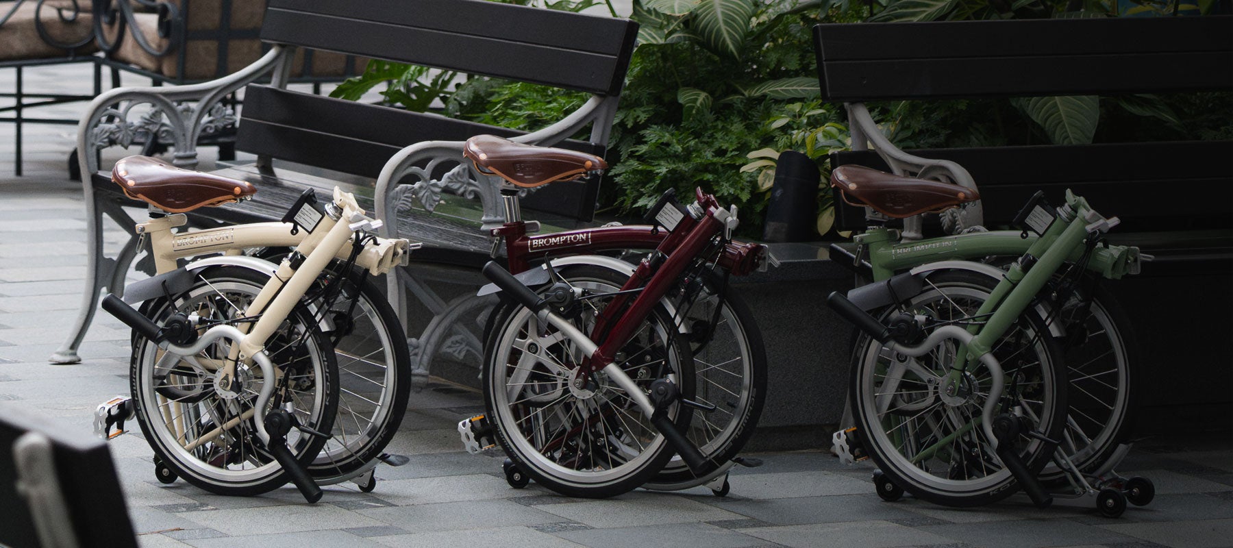 Three Brompton Classic Edition bikes