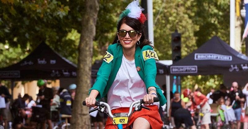 Person riding on a Brompton Bike at the Brompton World Championship.