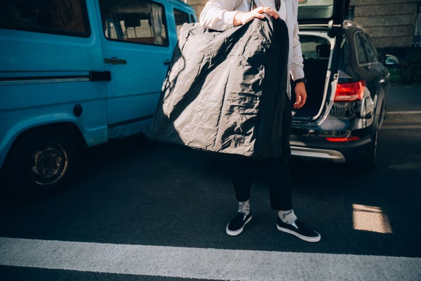 Person carrying a G Line transit bag
