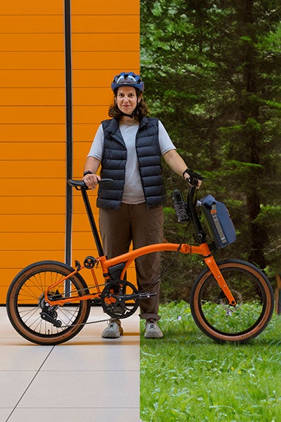 Woman stood with G Line bike