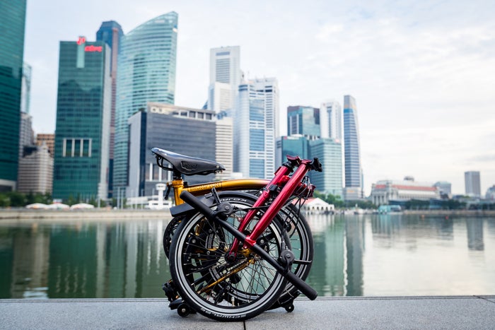 Lion City bike folded in front of river