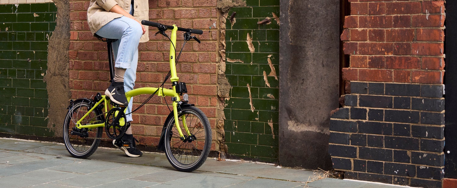 A Yuzu Lime C Line Explore against a wall