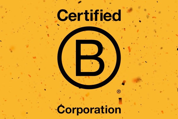 The graphic of the B Corp logo against a yellow background