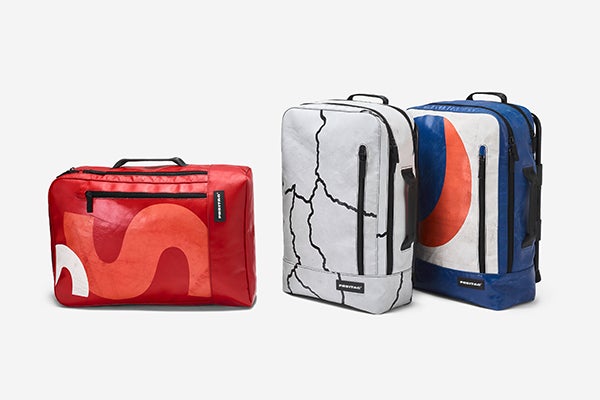 A studio shot of three Freitag x Brompton bags in red, white and blue
