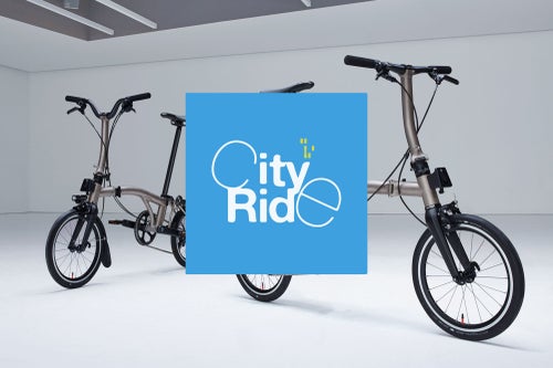 City ride logo over image of 2 brompton t line bikes in a studio
