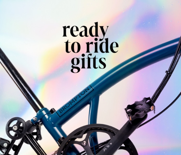 A holographic image of the Ready to Ride Brompton campaign