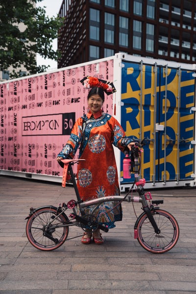 BWC best dressed winner posing with Brompton bike