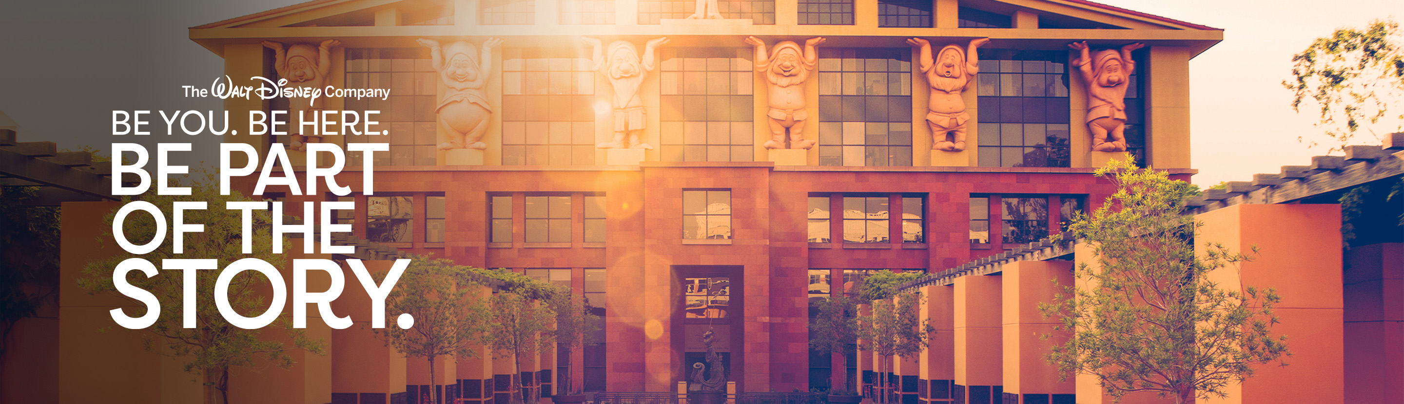 A sun flare coming up over The Walt Disney Studios lot