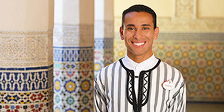 Cast member standing in EPCOT's Morocco Pavilion at Walt Disney World.