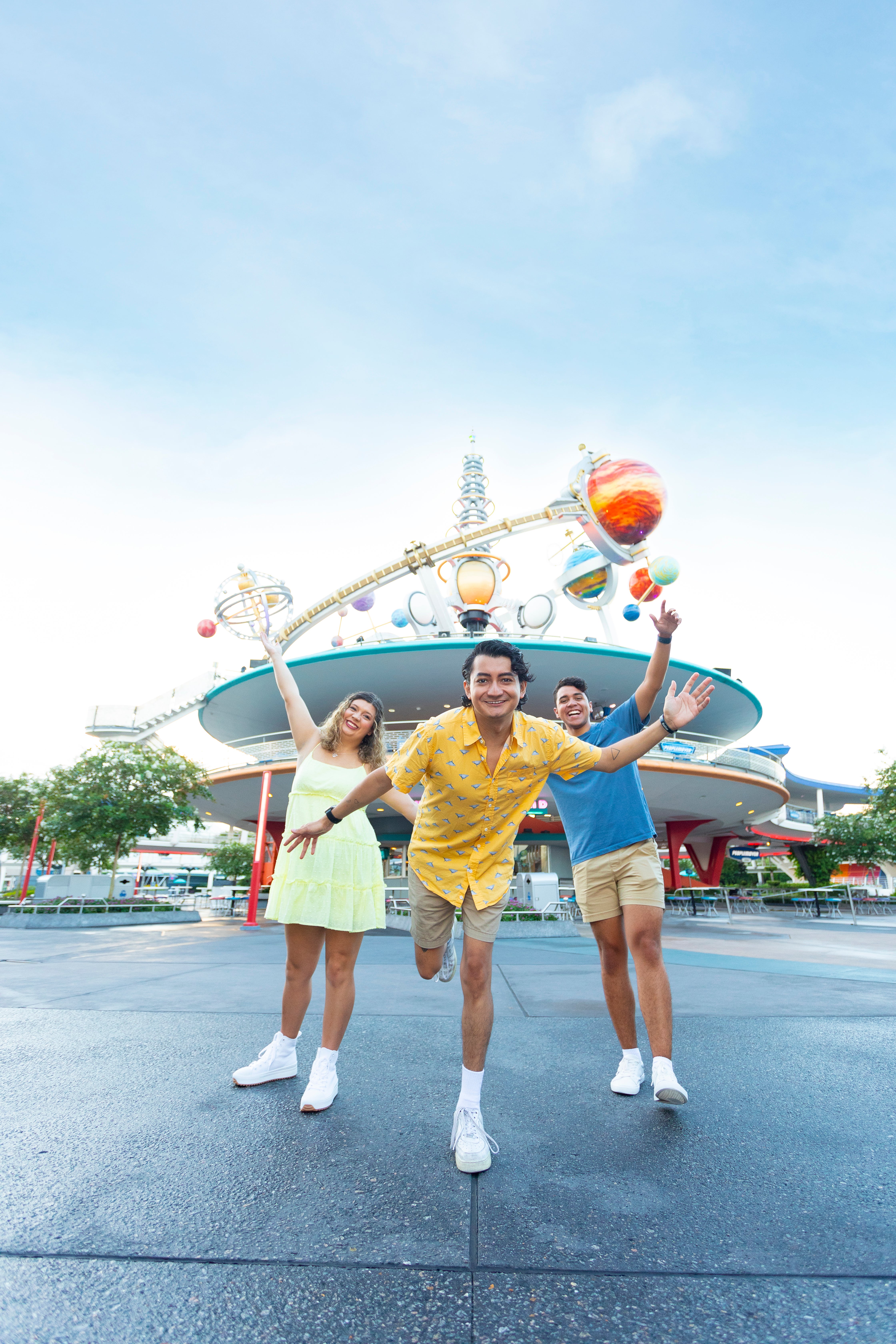 Three Disney College Program participants smiling at Walt Disney World Resort