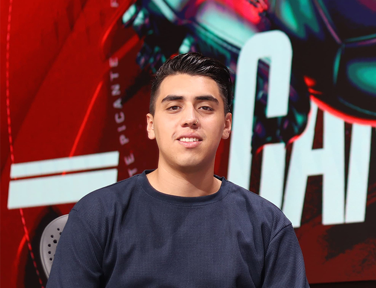 Mexico Apprentice Franz with short dark hair and a dark grey shirt smiling