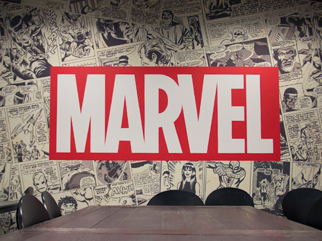 Marvel logo on a comic book wall