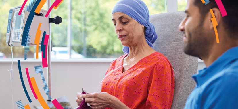 A patient sitting in a doctor's office and knitting while she waits to see the provider