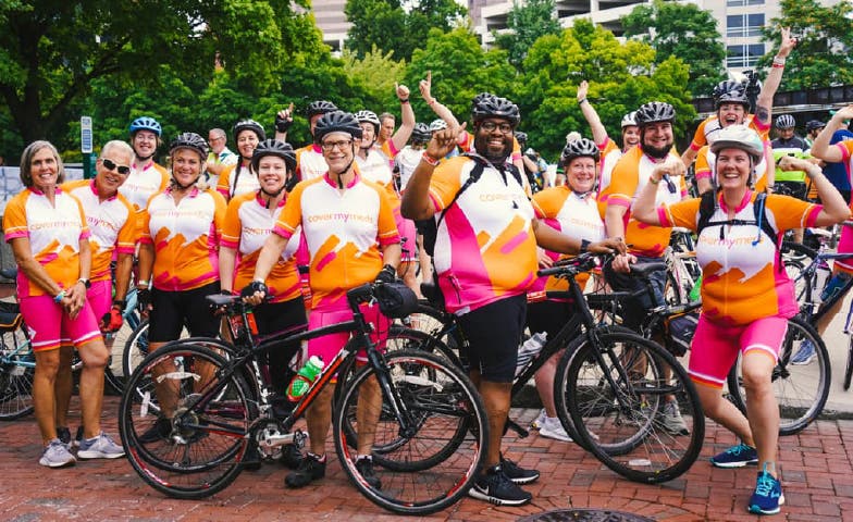 A group of employees standing together as a Pelatonia team