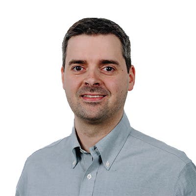 Headshot of Eli Puckett, Pharmacist in Charge
