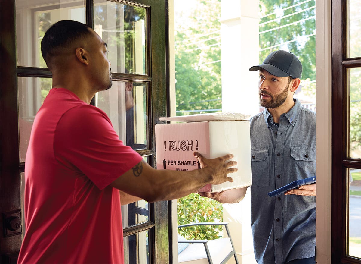 Patient receives mail-order medication package from courier.