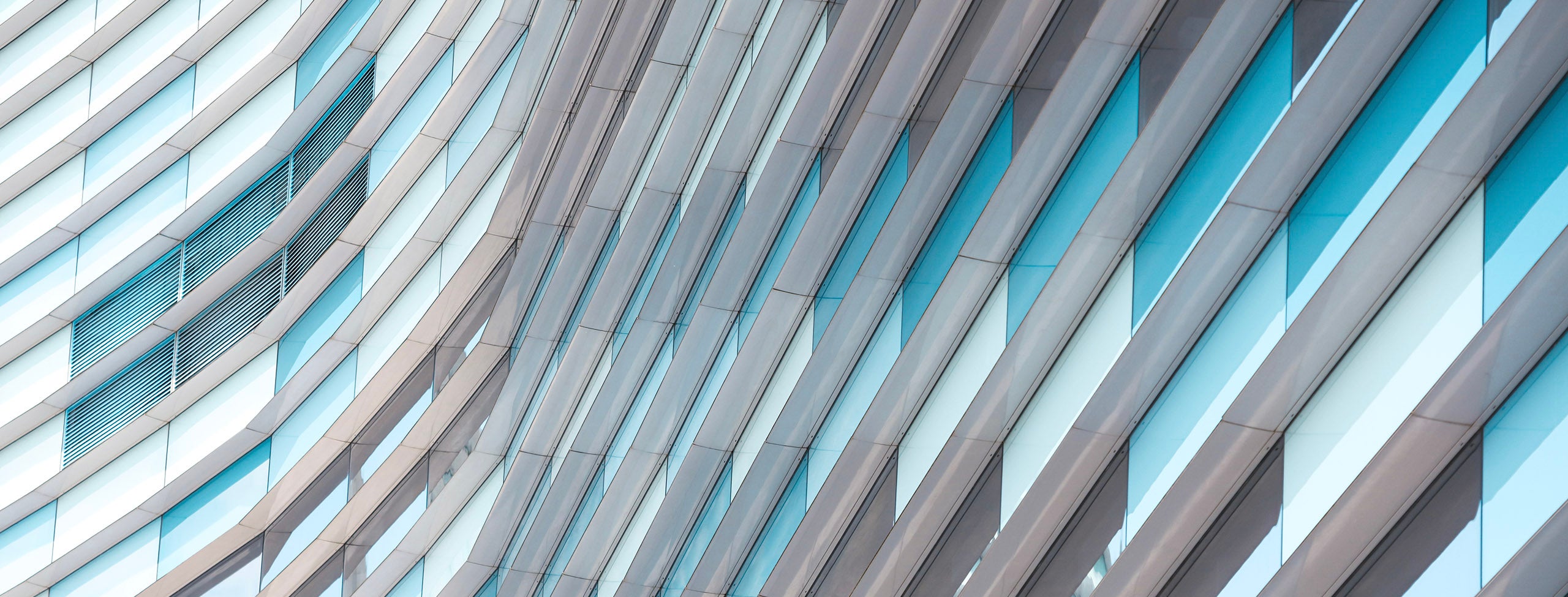 A_large_building_with_many_windows_PPT.jpg